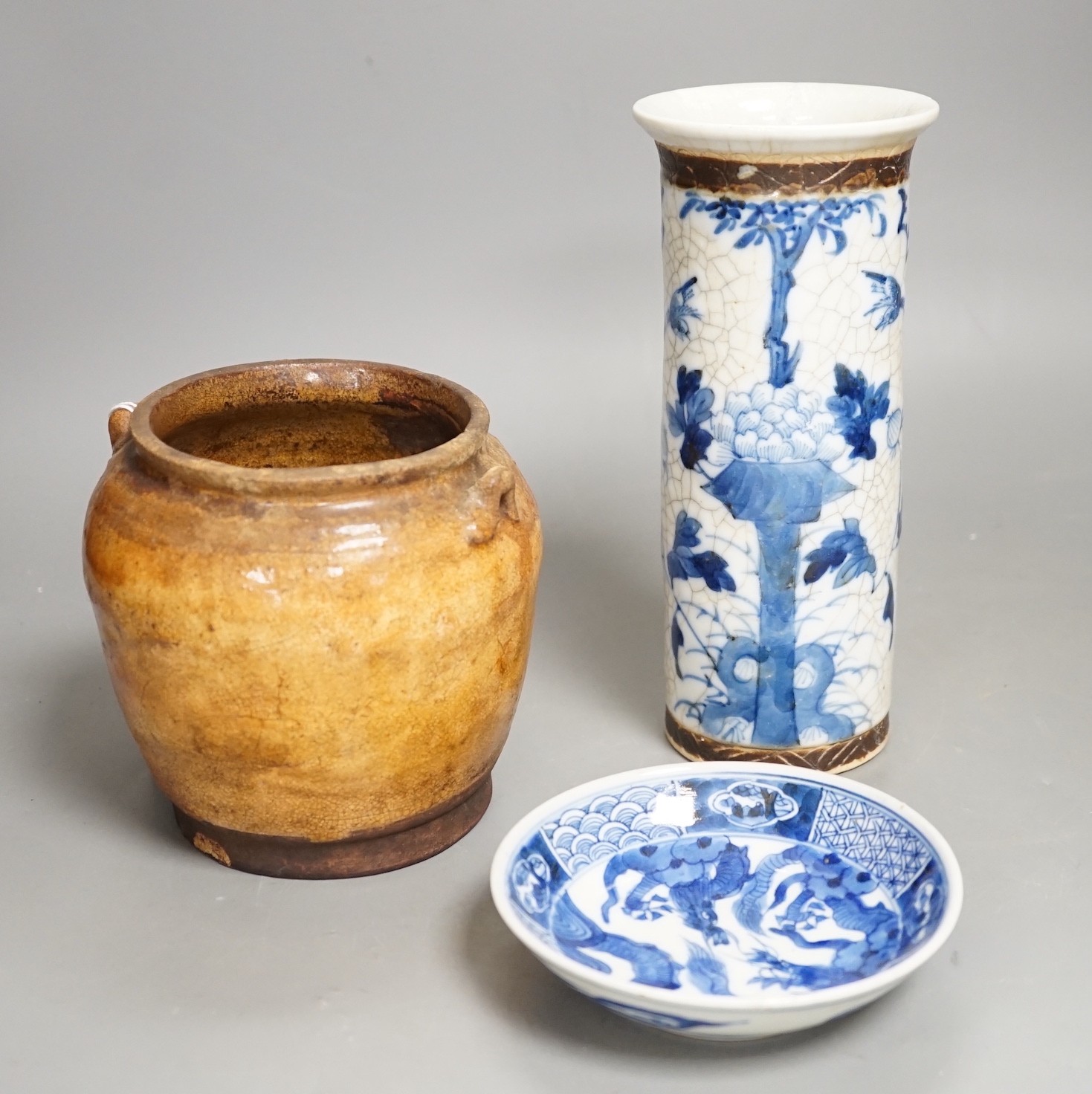 A Chinese crackle glaze blue and white sleeve vase, 20cm high, similar dish and pottery vessel